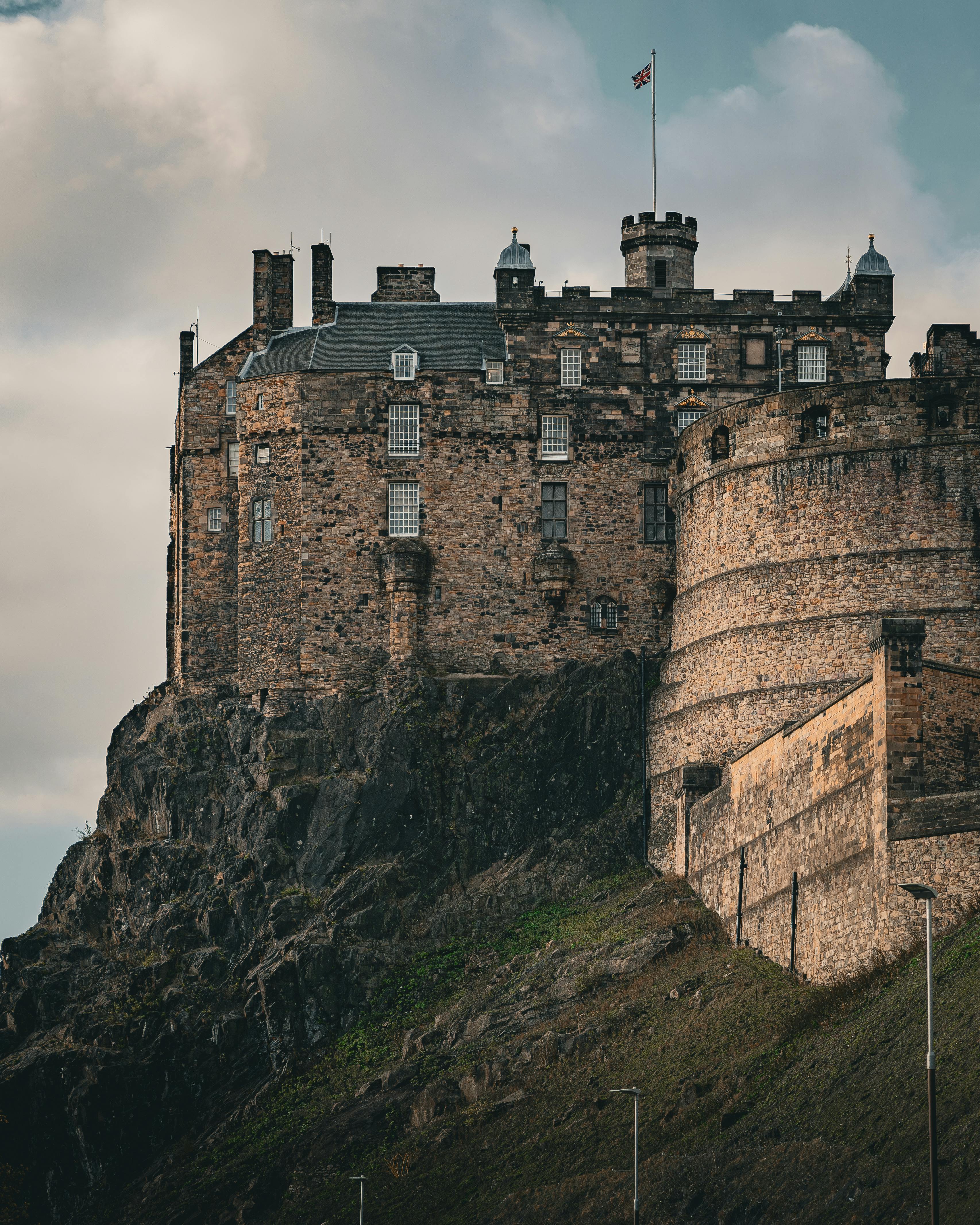 Moody, gothic aesthetic showcasing Edinburgh Castle; rich, aged stone textures define the art prints and decor collection.

