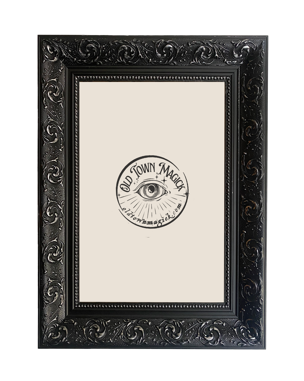 Elegant black picture frame with ornate swirling details, showcasing art prints and wall decor.