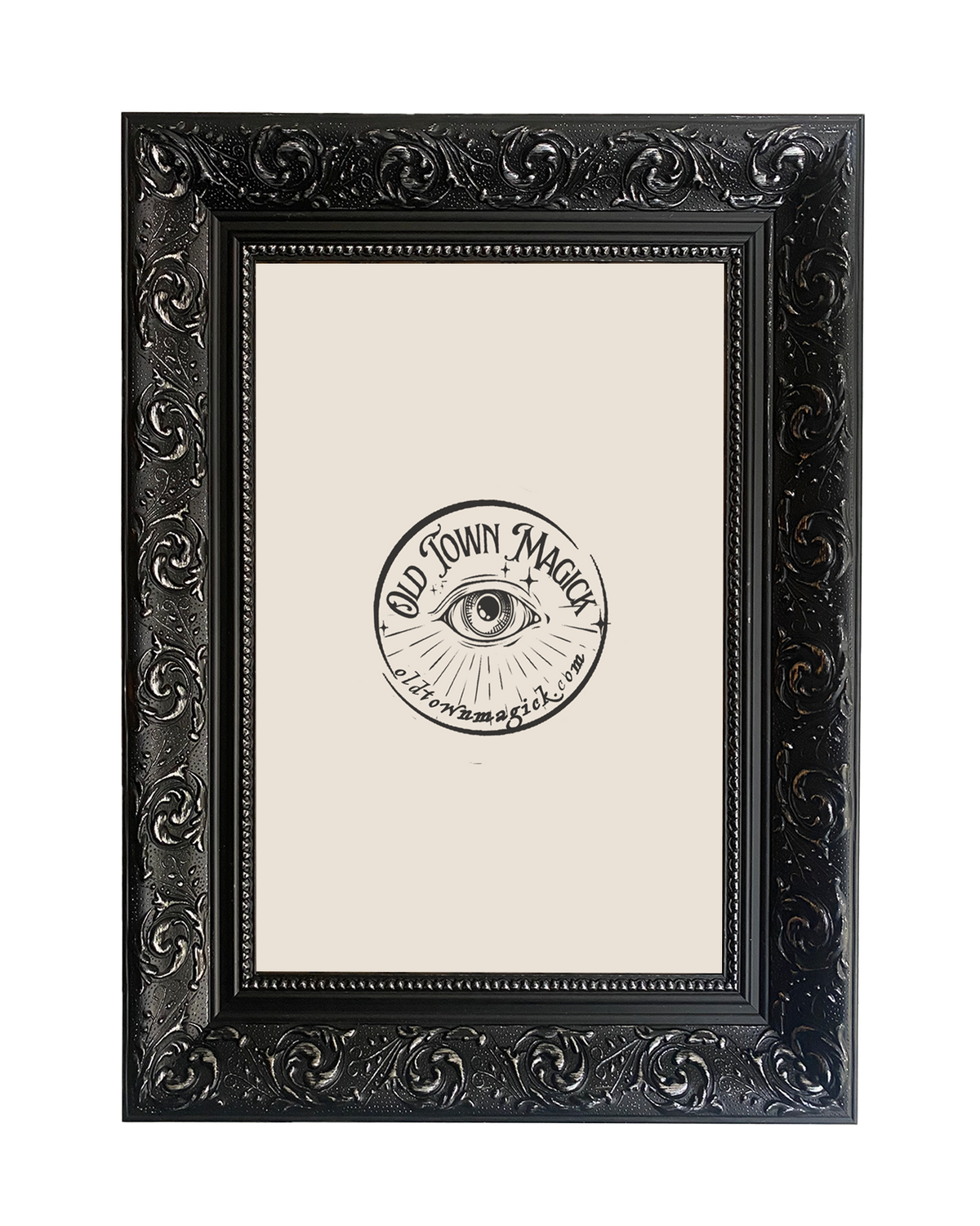 Elegant black picture frame with ornate swirling details, showcasing art prints and wall decor.