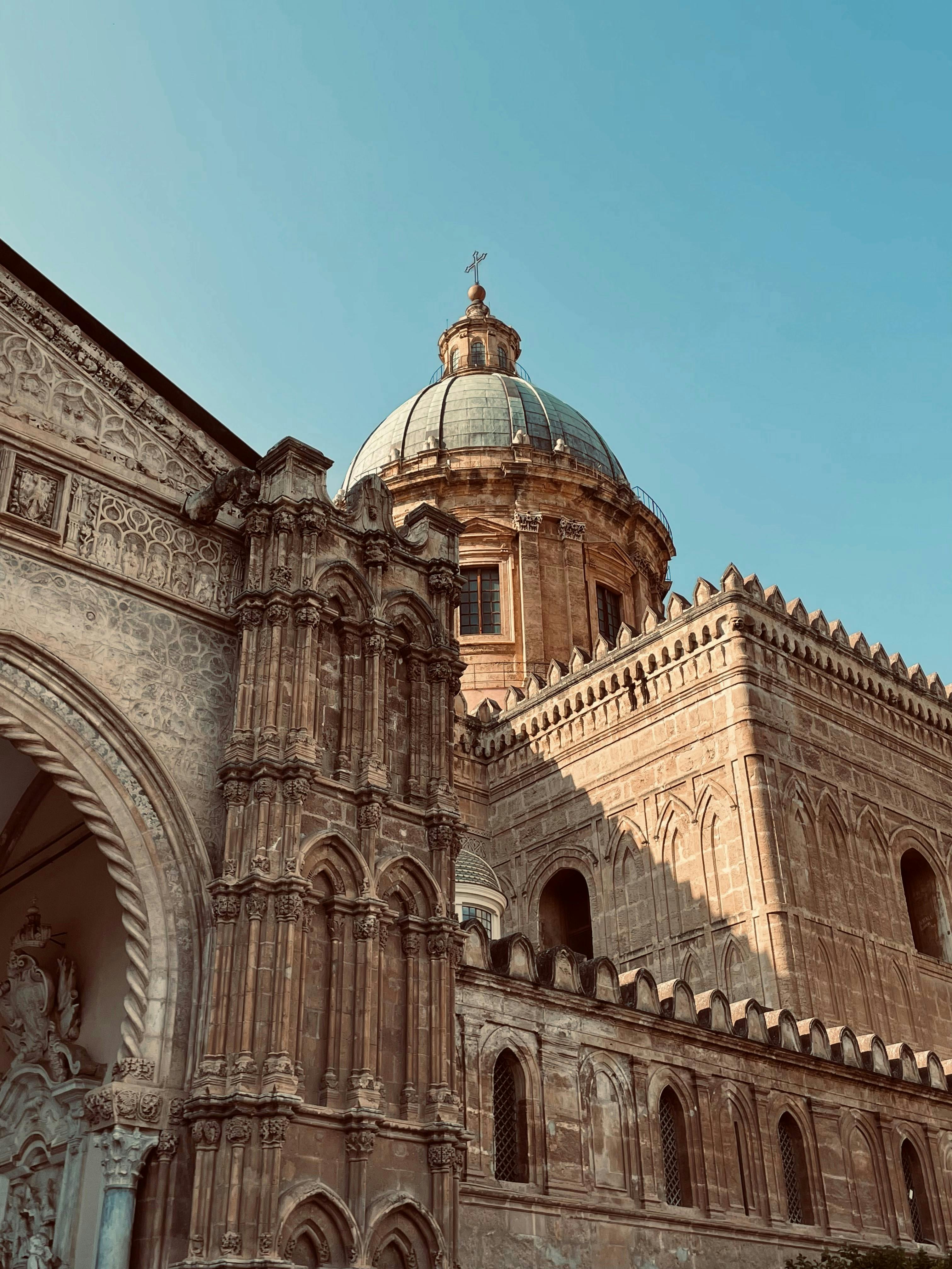 Warm, golden-hued architecture evokes the Sicilian sun in this collection of Palermo-inspired art and decor.
