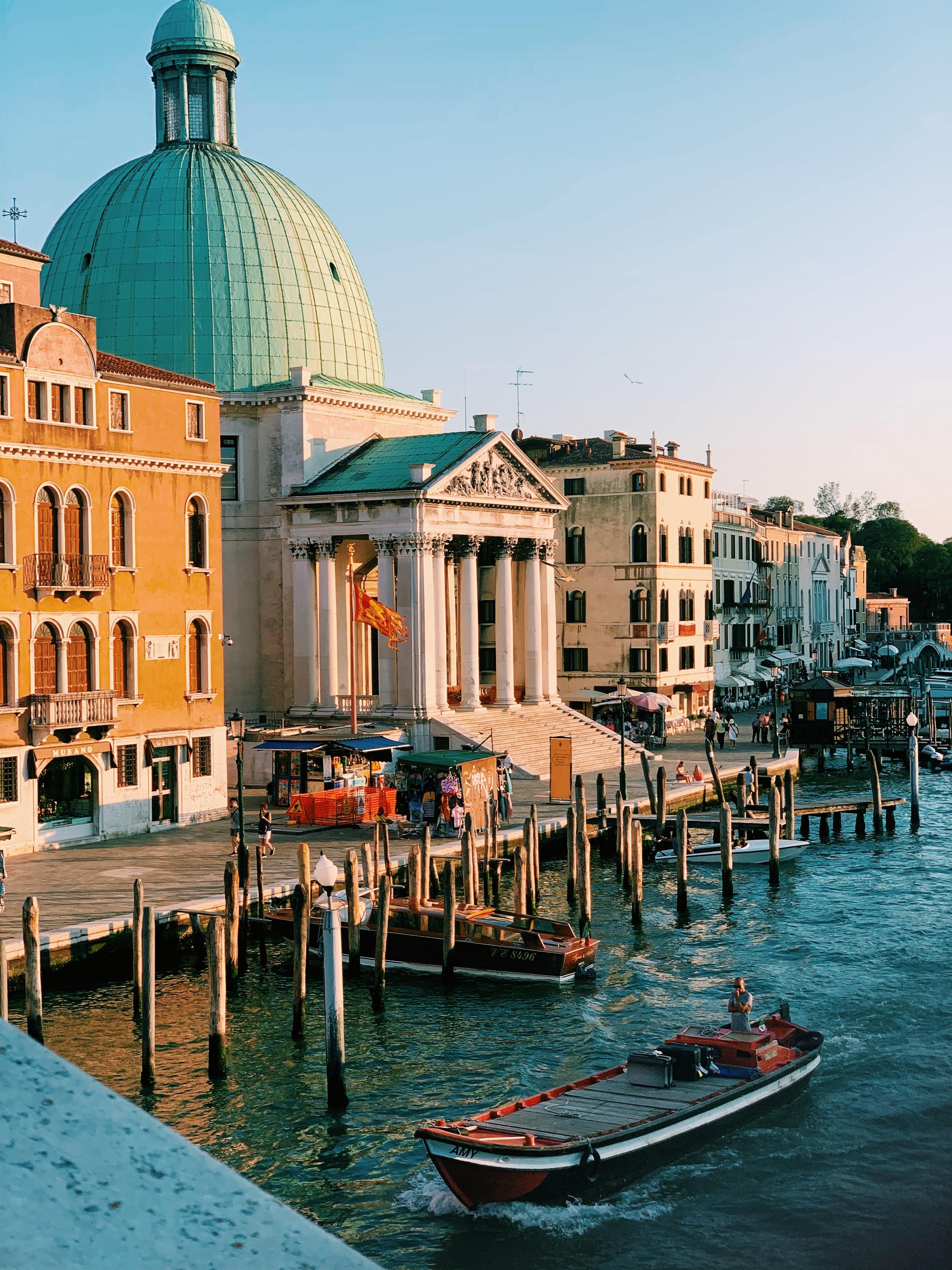 Venetian charm: Warm golden hues illuminate historic architecture and serene waterways, inspiring unique art and decor.
