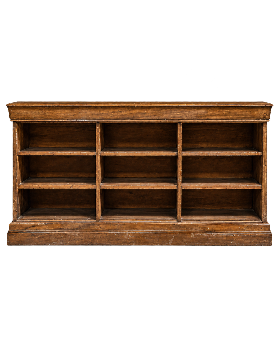 Wide wooden wall shelf with nine open compartments against a black background.