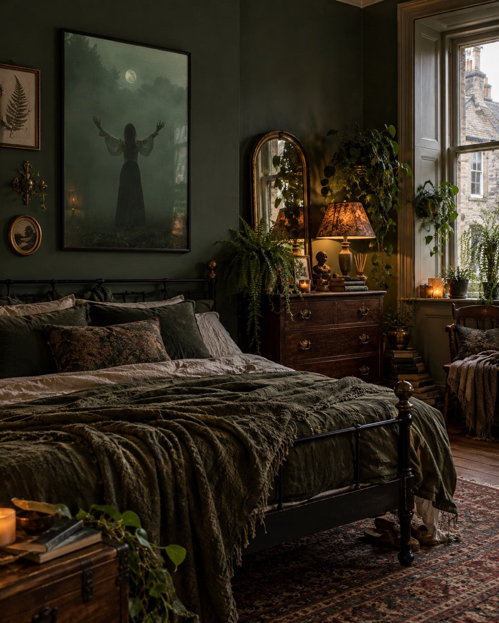 Dark green bedroom with a black-robed figure artwork above the bed and leafy plants.