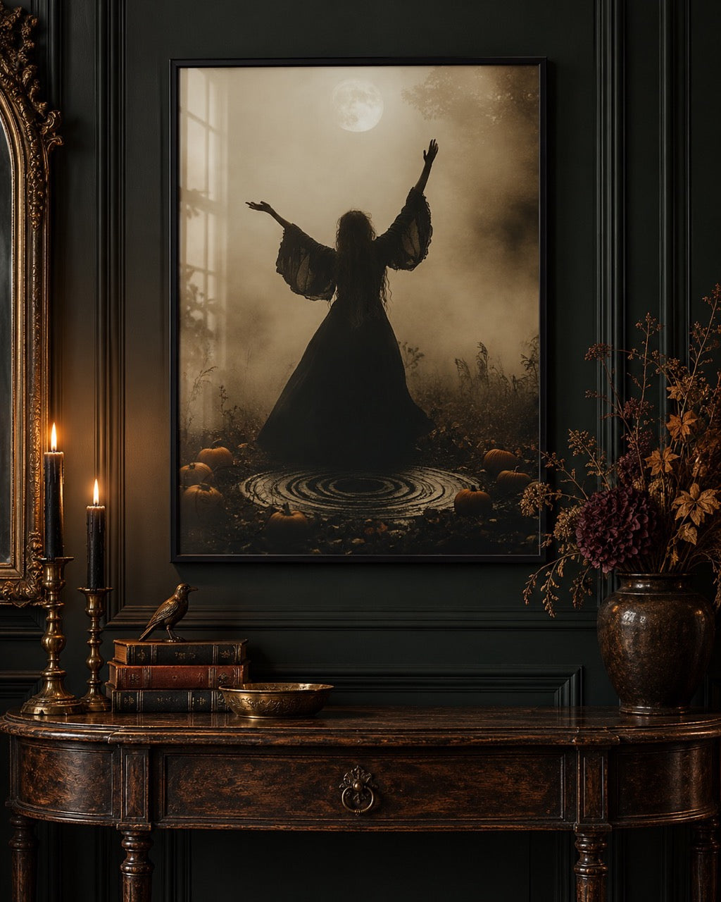 Dark framed artwork of a black-robed figure with raised arms above an ornate console.